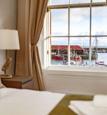View of boats at Arbroath Harbour from bedroom window at 1 Shore self catering accommodation in Arbroath