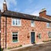 Exterior view of Thrums Cottage in Kirriemuir
